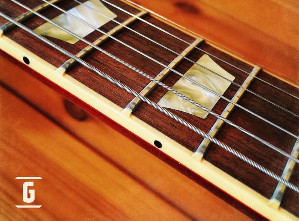 Nibs in the binding of Gibson guitars